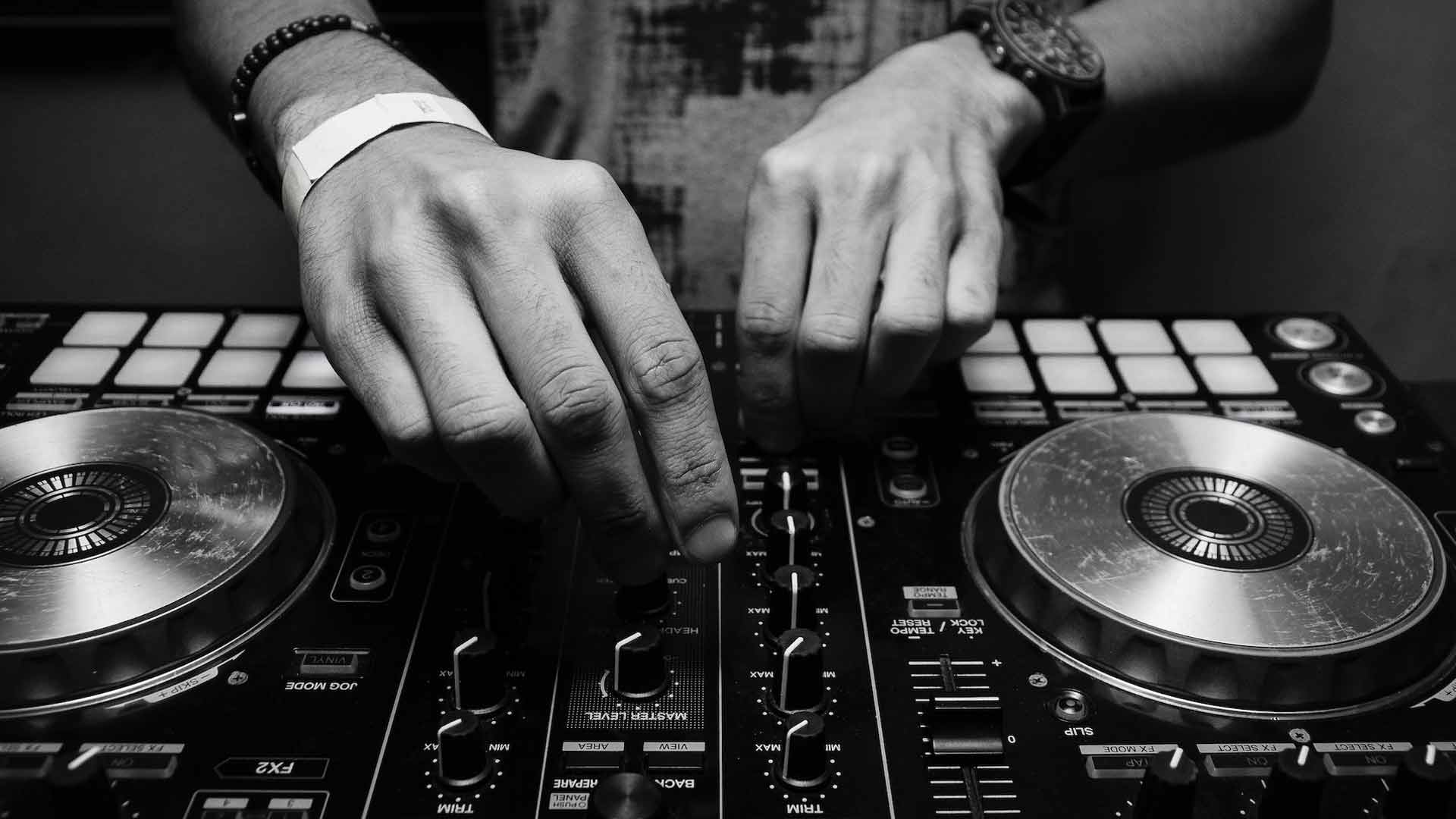 DJ using a DJ Controller to start DJing as a hobby or a business