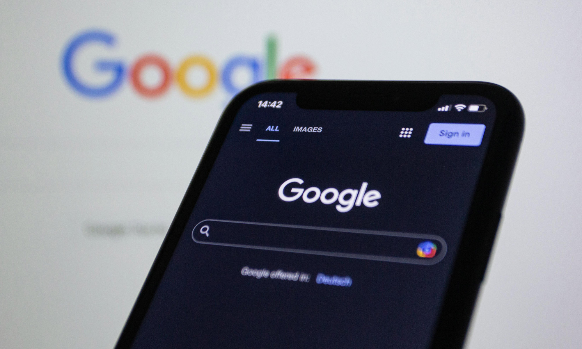 Google Search slash screens on monitor and Android phone being used for DJ Marketing and SEO Blog Post.