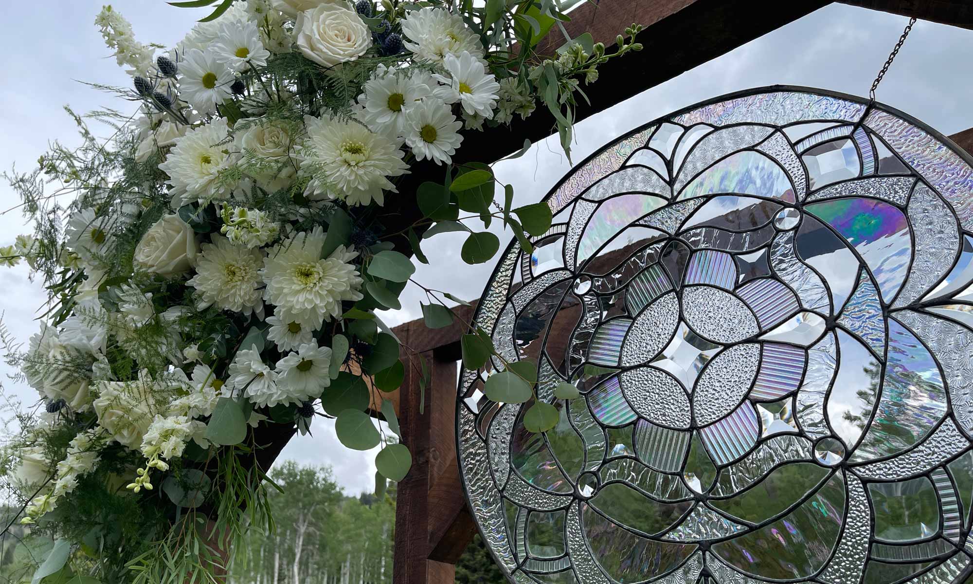 The arch at Dana and Chandler's wedding at Grand Targhee Resort on June 20, 2025