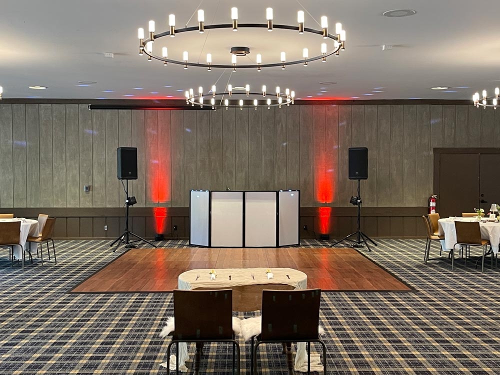 DJ booth and dance floor at Kristen and Gray's wedding reception at The Virginian